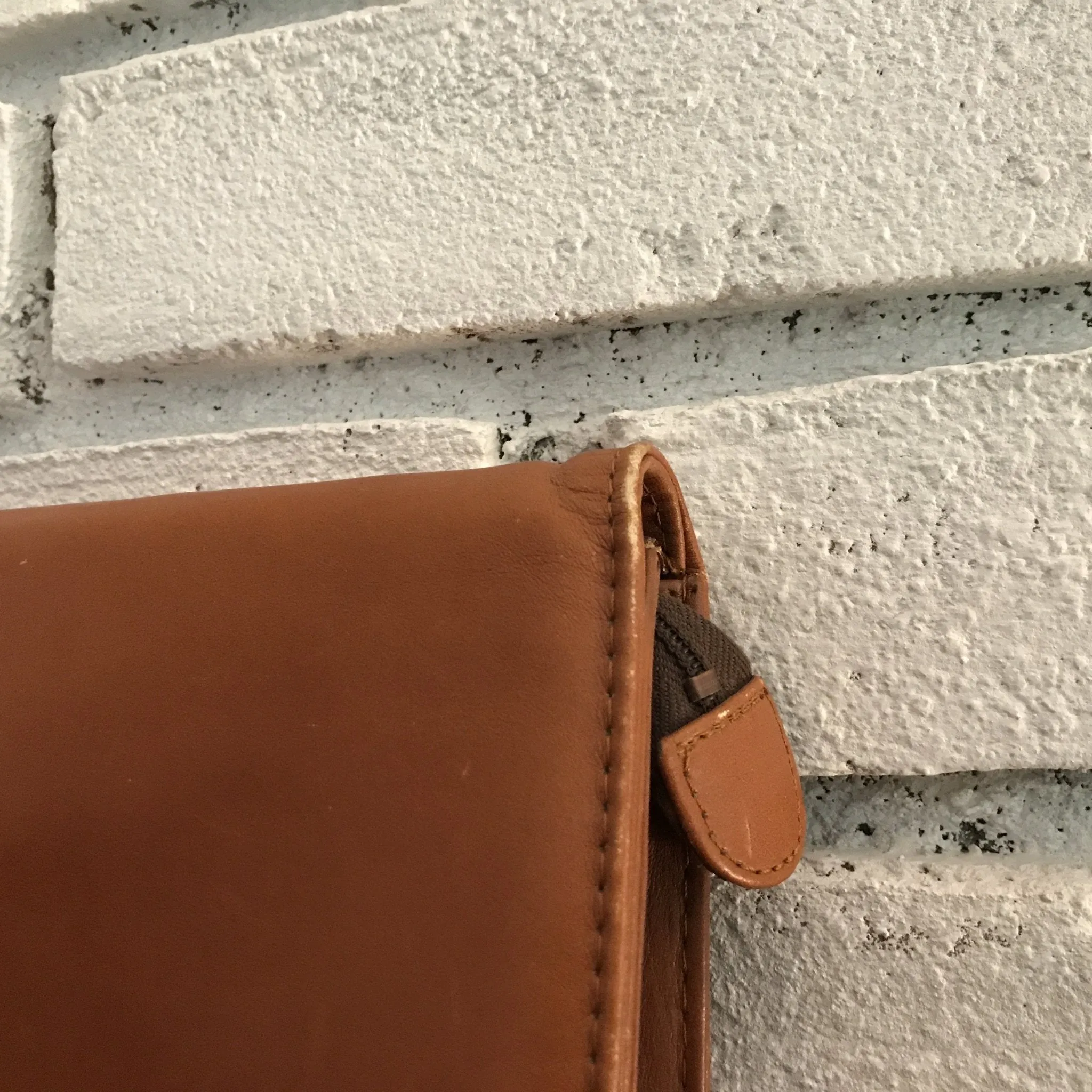 Vintage Leather Clutch from Saks Fifth Avenue Spain. Strap and Gold Accents. Circa 1970.